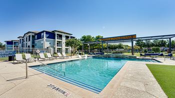 take a dip in the resort style pool  at Highland Luxury Living, Lewisville, Texas